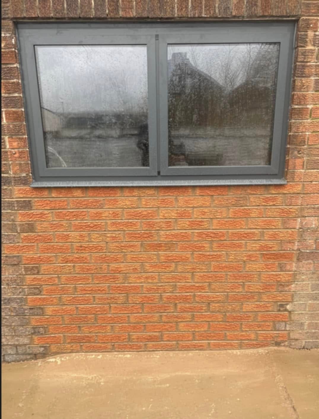 After: new brickwork and window surround finished neatly