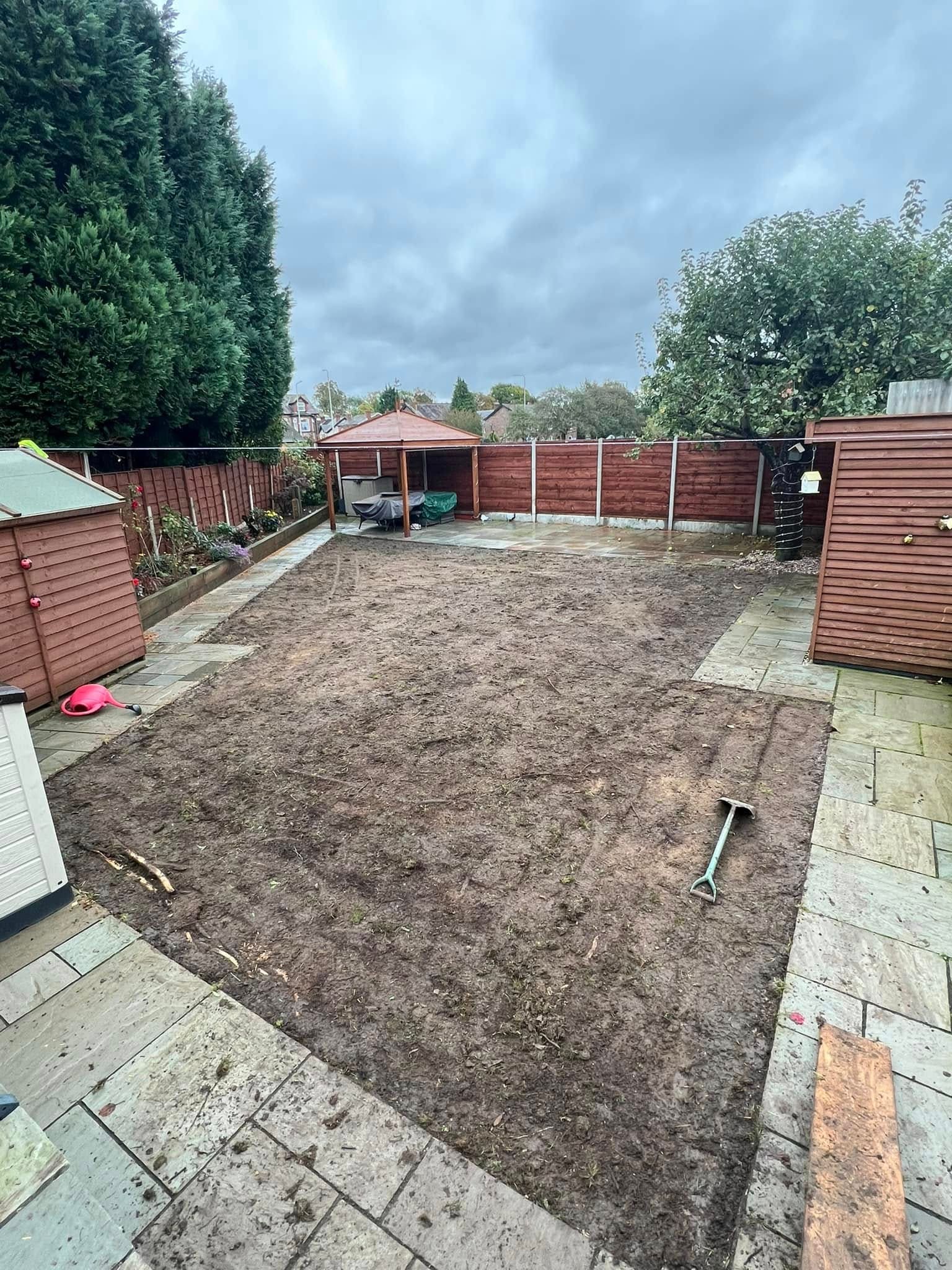 Before: bare rear garden awaiting landscaping